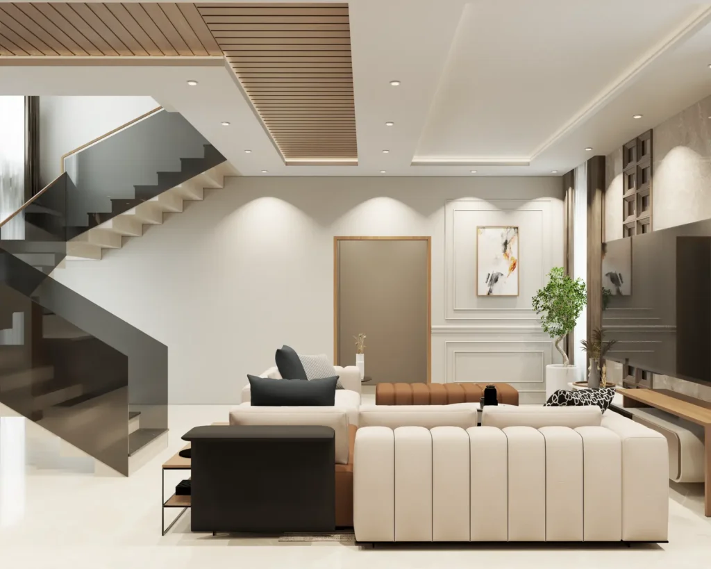 3D design of a Vijayapura 4 BHK living area with glass-railing staircase, wooden slat ceiling, wall moulding panels and sectional sofa by Aladi Interiors
