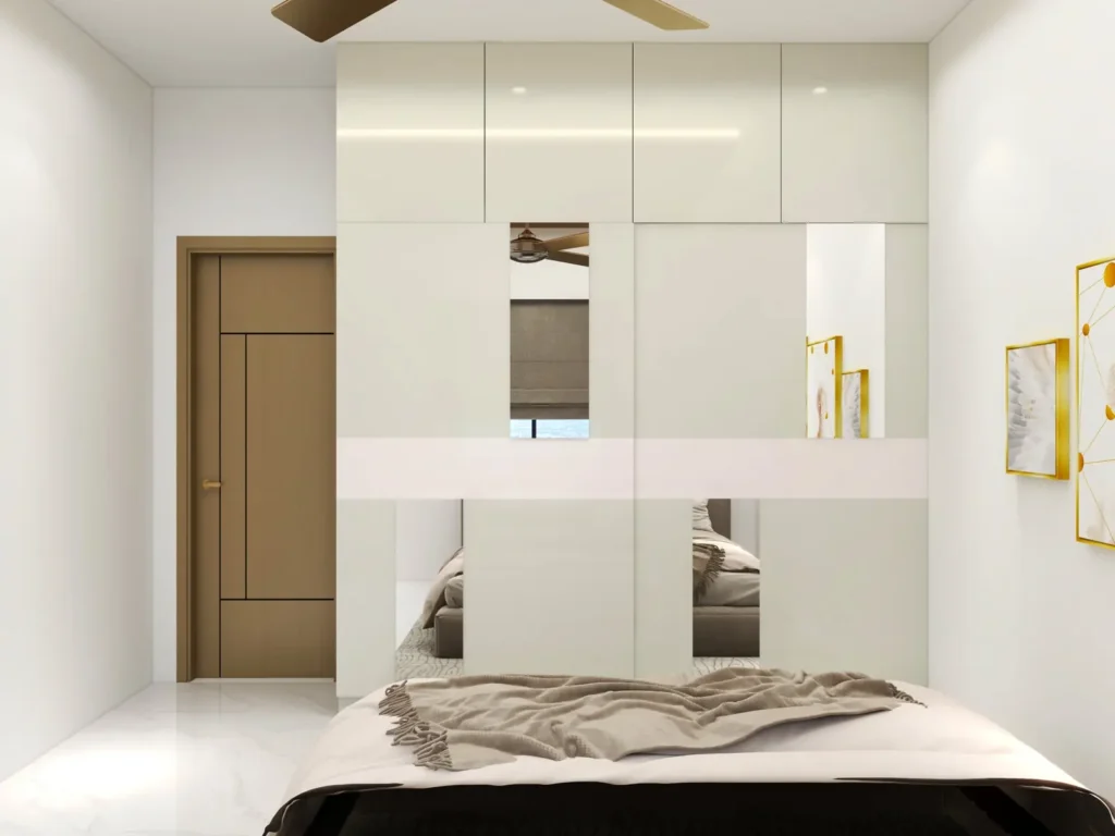 3D design of a bedroom in a Dharwad duplex villa with floor-to-ceiling ivory gloss wardrobe, mirror strip inserts and loft storage by Aladi Interiors