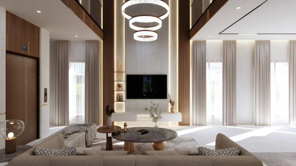 3D design of a double-height villa living room in Kushtagi with ring chandelier, stone-finish TV wall, wooden pillars and full-height curtains by Aladi Interiors